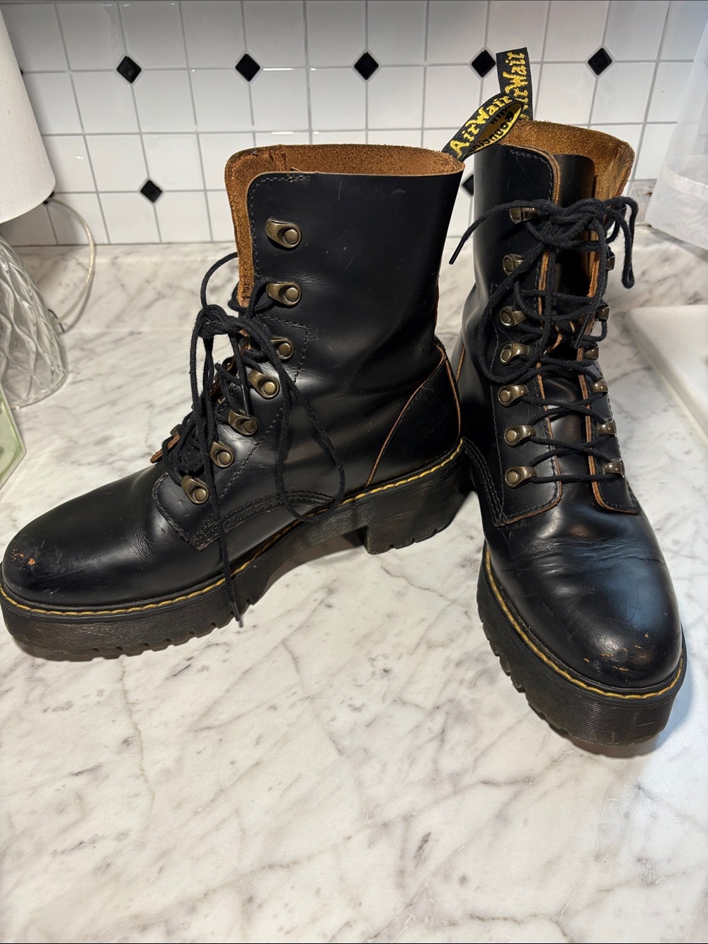 Dr. Martens LEONA Black Leather Platform Lace-Up Combat Boots with Brown Lining